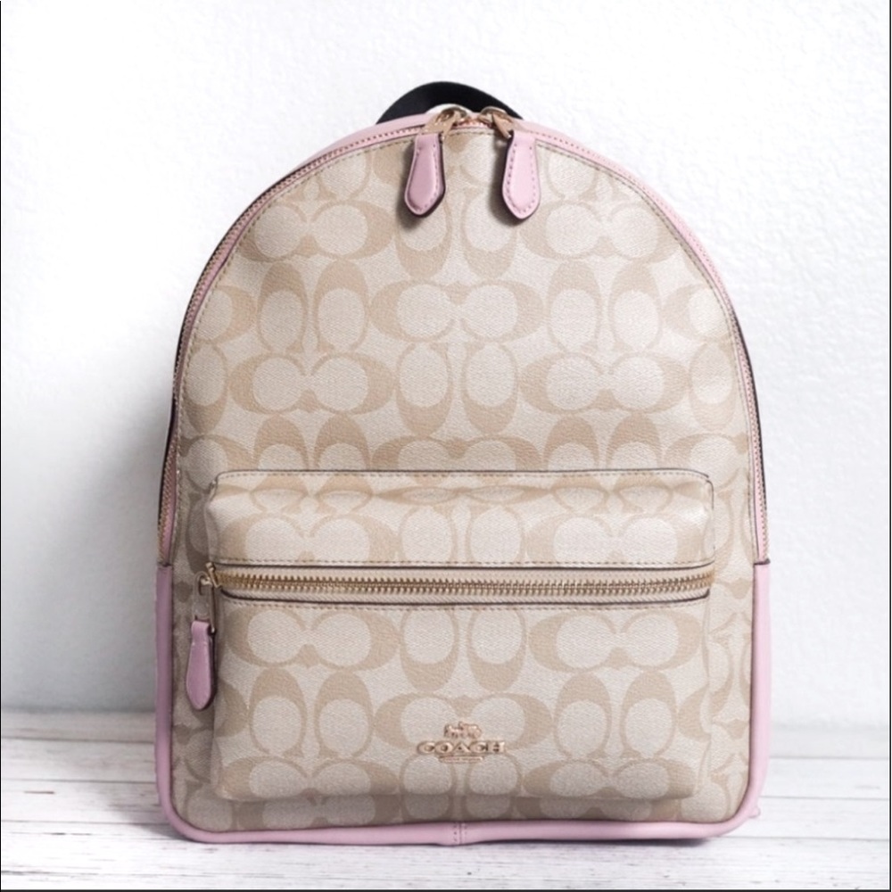 Light pink and khaki coach backpack